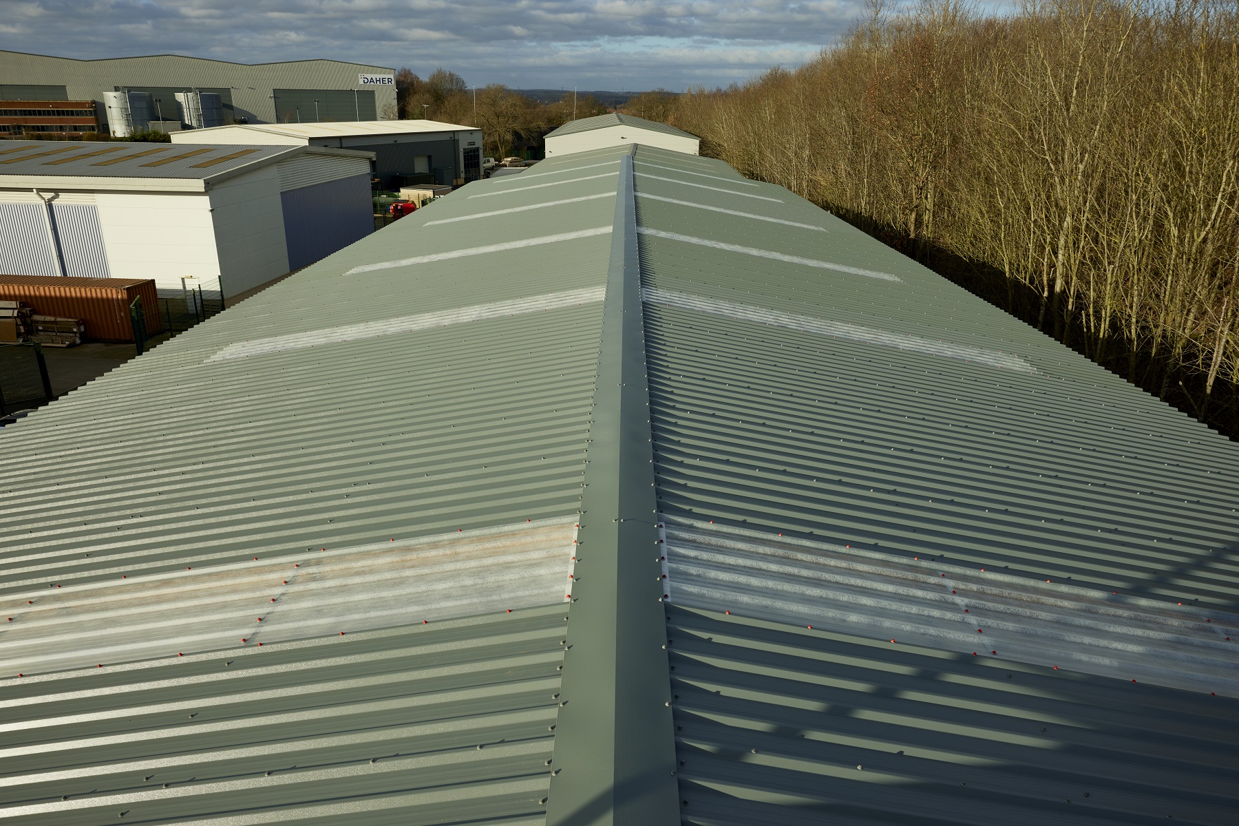 A cladded roof with rooflights